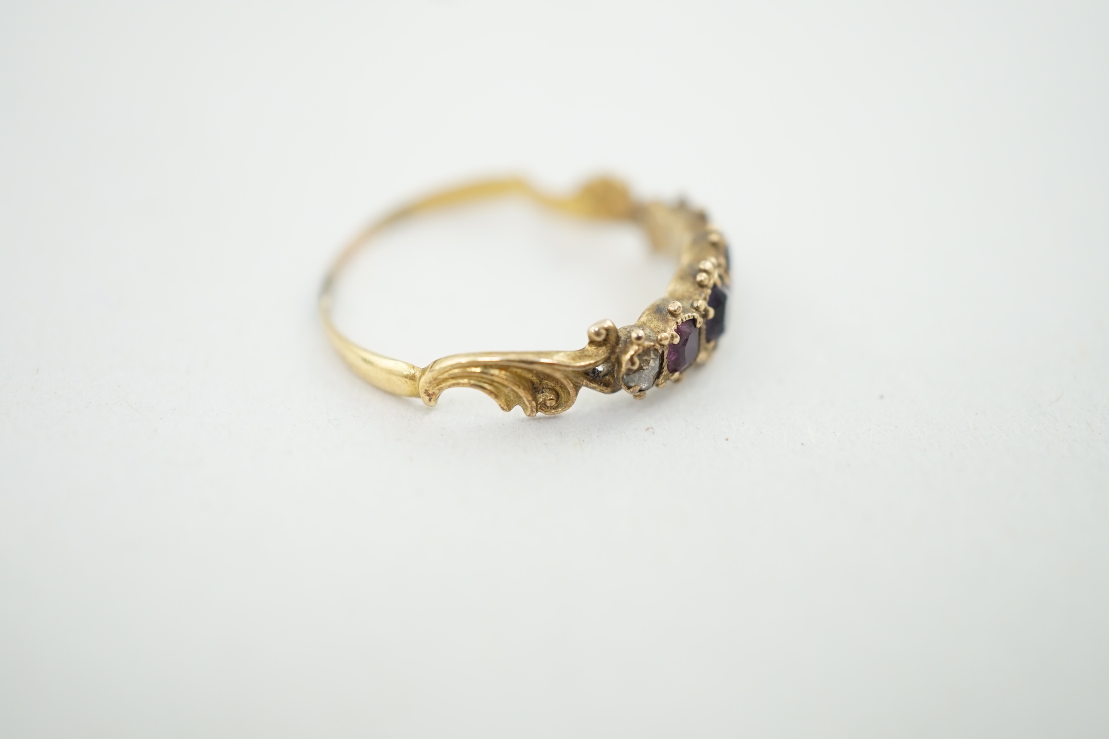 A Victorian gold and gem set 'Regard' half hoop ring